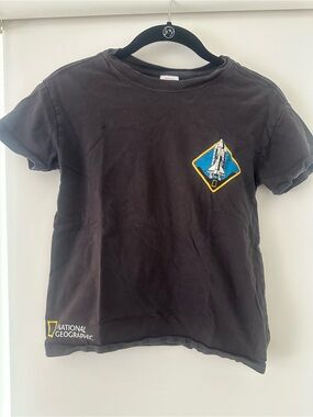 Hanna Andersson Black Tee with Yellow & Blue Shuttle Patch